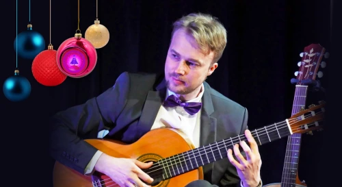 Постер Новогодний концерт «Одна снежинка ещё не снег» гитарист-виртуоз Алексей Носов — переложения любимых мелодий. Вечеринка с фуршетом, с викториной, с призами в музее на Невском.